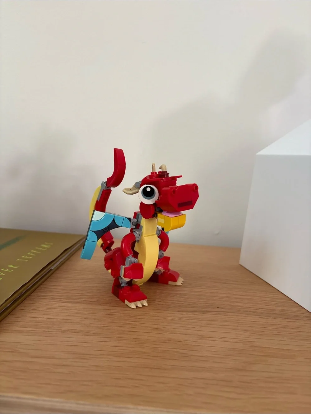 Lego Red Dragon Figure with Yellow and Blue Accents